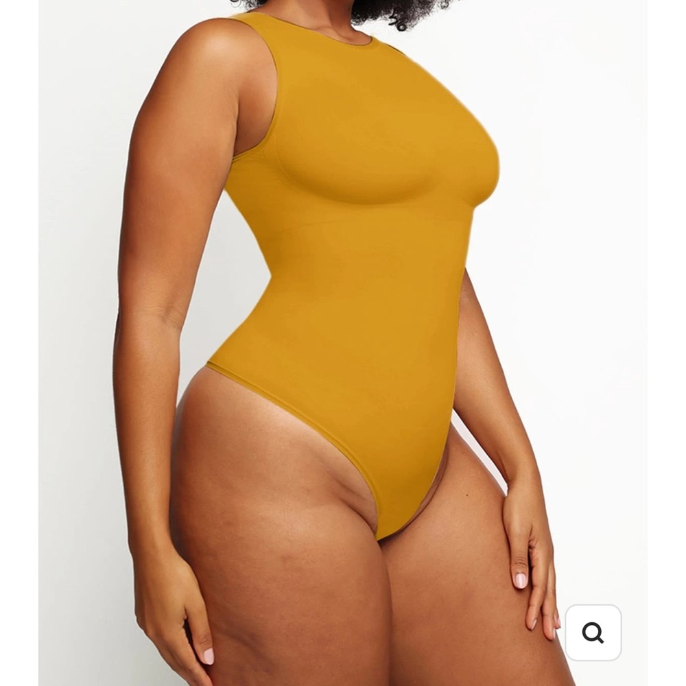 Extra large sleeveless bodysuit with support tags on made by feelin girl orange